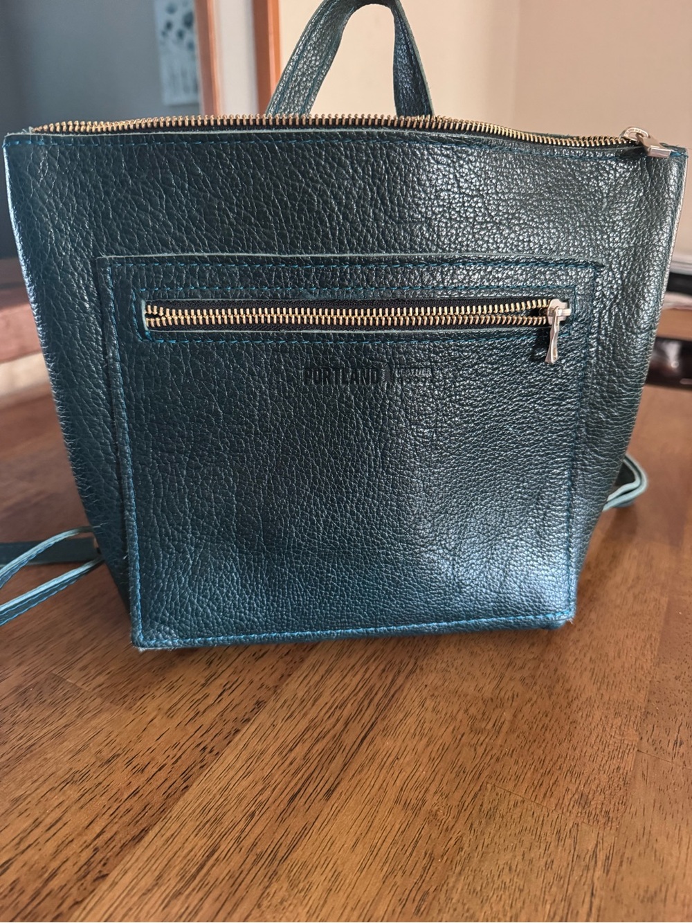 EUC Portland Leather small tote backpack in Lagoon
